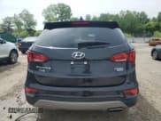 ✅ 2017 Hyundai Santa Fe 2.4L • VIN: 5NMZUDLB4HH035278 • Lot: 57502165. Listed on Copart with 69,345 mi. Free auction sales archive from the USA and detailed vehicle history report at DreamBid. Image 6.