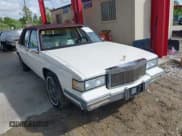 ✅ 1988 Cadillac DeVille • VIN: 1G6CD5154J4297778 • Lot: 41611765. Wystawiony na IAAI z przebiegiem 92 434 mil. Bezpłatny archiwum sprzedaży aukcyjnych z USA i szczegółowy raport historii pojazdu na DreamBid. Zdjęcie 1.