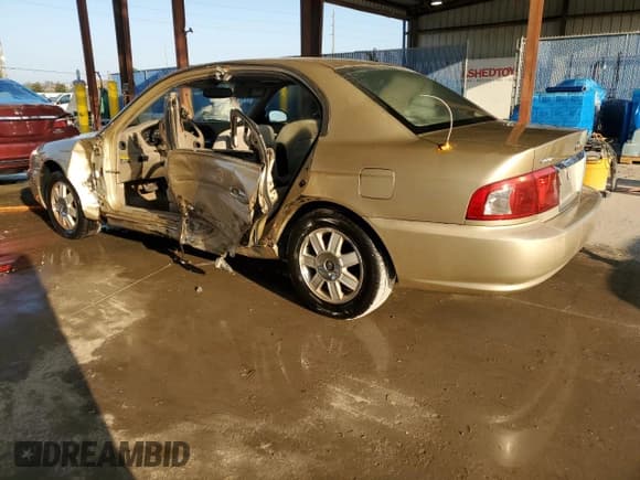 ✅ 2003 Kia Optima LX • VIN: KNAGD128X35248644 • Лот: 75536844. Опубликован ранее на Copart с пробегом 146 691 миль. Бесплатный доступ к архиву аукционных продаж из США и подробный отчёт об истории автомобиля на DreamBid. Изображение 2.