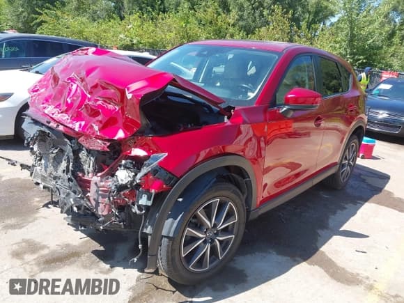 ✅ 2018 Mazda CX-5 Touring • VIN: JM3KFBCM7J0444602 • Lot: 43083220. Listed on IAAI with 77,993 mi. Free auction sales archive from the USA and detailed vehicle history report at DreamBid. Image 2.