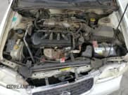 ✅ 2000 Nissan Sentra XE • VIN: 3N1CB51DXYL353143 • Lot: 55061205. Wystawiony na Copart z przebiegiem 145 737 mil. Bezpłatny archiwum sprzedaży aukcyjnych z USA i szczegółowy raport historii pojazdu na DreamBid. Zdjęcie 11.