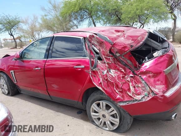✅ 2016 Cadillac SRX • VIN: 3GYFNAE35GS584297 • Lot: 43028756. Listed on IAAI with Not provided. Free auction sales archive from the USA and detailed vehicle history report at DreamBid. Image 14.