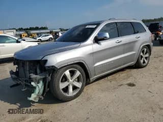 ✅ 2016 Jeep Grand Cherokee Overland • VIN: 1C4RJFCG8GC319896 • Lot: 65574925. Listed on Copart with 136,343 mi. Free auction sales archive from the USA and detailed vehicle history report at DreamBid. Image 1.