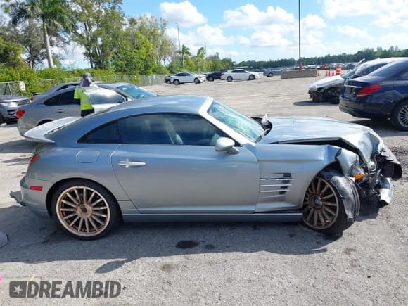 ✅ 2005 Chrysler Crossfire SRT-6 • VIN: 1C3AN79N65X040681 • Лот: 43715112. Опубликован ранее на IAAI с пробегом 114 571 миль. Бесплатный доступ к архиву аукционных продаж из США и подробный отчёт об истории автомобиля на DreamBid. Изображение 13.