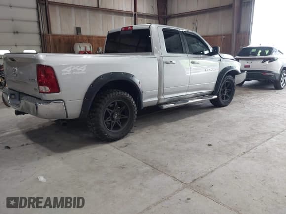 ✅ 2012 Ram 1500 SLT • VIN: 1C6RD7GP0CS102986 • Lot: 42210247. Listed on IAAI with 120,815 mi. Free auction sales archive from the USA and detailed vehicle history report at DreamBid. Image 4.