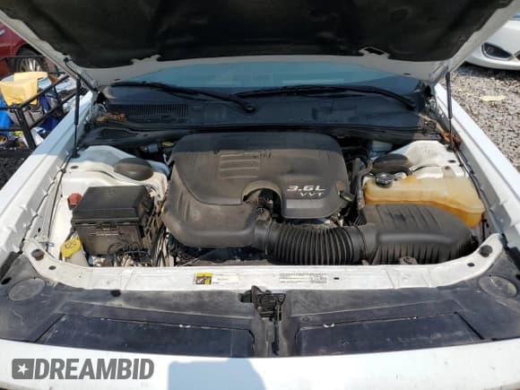 ✅ 2014 Dodge Challenger SXT • VIN: 2C3CDYAGXEH270582 • Lot: 62692464. Wystawiony na Copart z przebiegiem 140 302 mil. Bezpłatny archiwum sprzedaży aukcyjnych z USA i szczegółowy raport historii pojazdu na DreamBid. Zdjęcie 11.