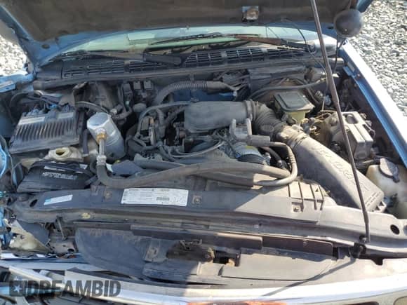 1997 Chevrolet Blazer LS z VIN 1GNDT13W7V2156165, wystawiony jako Copart lot #66759394 z przebiegiem 170 046 mil mil oraz Szkoda całkowita • Salvage title. Historia ofert i sprzedaży dostępna na DreamBid. Obrazek 13.