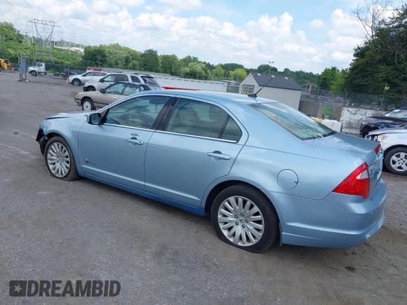 ✅ 2010 Ford Fusion Hybrid • VIN: 3FADP0L34AR294982 • Лот: 42754341. Опубликован ранее на IAAI с пробегом 119 602 миль. Бесплатный доступ к архиву аукционных продаж из США и подробный отчёт об истории автомобиля на DreamBid. Изображение 3.