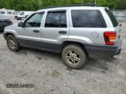 ✅ 2004 Jeep Grand Cherokee Laredo • VIN: 1J4GW48S34C184715 • Лот: 57272955. Опубликован ранее на Copart с пробегом 245 902 миль. Бесплатный доступ к архиву аукционных продаж из США и подробный отчёт об истории автомобиля на DreamBid. Изображение 2.