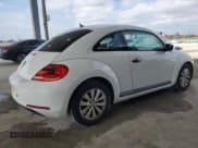 ✅ 2013 Volkswagen Beetle 2.5L • VIN: 3VWFP7AT9DM645933 • Lot: 90586815. Listed on Copart with 111,049 mi. Free auction sales archive from the USA and detailed vehicle history report at DreamBid. Image 3.