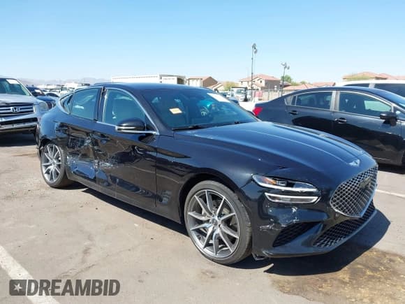 ✅ 2023 Genesis G70 2.0T • VIN: KMTG34TA3PU132398 • Lot: 42497066. Listed on IAAI with 34,759 mi. Free auction sales archive from the USA and detailed vehicle history report at DreamBid. Image 1.