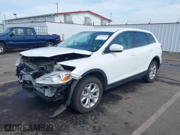✅ 2011 Mazda CX-9 Touring • VIN: JM3TB3CV7B0322774 • Lot: 42514234. Listed on IAAI with 97,785 mi. Free auction sales archive from the USA and detailed vehicle history report at DreamBid. Image 2.