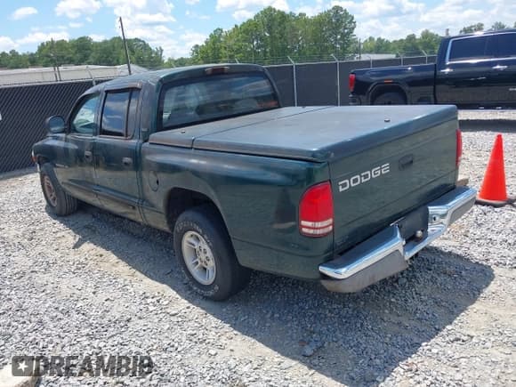 ✅ 2000 Dodge Dakota Sport • VIN: 1B7GL2AX1YS634818 • Lot: 42859891. Listed on IAAI with 132,734 mi. Free auction sales archive from the USA and detailed vehicle history report at DreamBid. Image 3.