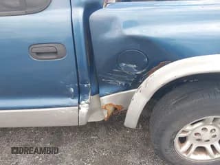 ✅ 2002 Dodge Dakota SLT • VIN: 1B7HL48XX2S668382 • Lot: 42203326. Wystawiony na IAAI z przebiegiem Nie podano. Bezpłatny archiwum sprzedaży aukcyjnych z USA i szczegółowy raport historii pojazdu na DreamBid. Zdjęcie 6.