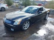 ✅ 2005 Cadillac XLR • VIN: 1G6YV34A155602458 • Lot: 43721615. Listed on IAAI with 106,799 mi. Free auction sales archive from the USA and detailed vehicle history report at DreamBid. Image 2.