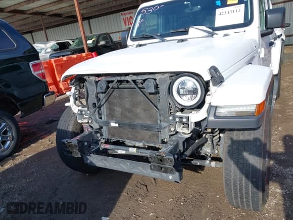 ✅ 2018 Jeep Wrangler Unlimited Sahara • VIN: 1C4HJXEG0JW321355 • Lot: 42343112. Listed on IAAI with 102,457 mi. Free auction sales archive from the USA and detailed vehicle history report at DreamBid. Image 19.