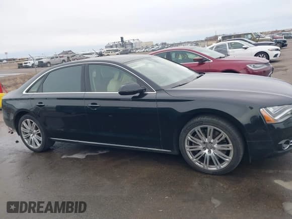 ✅ 2013 Audi A8 4.0L • VIN: WAUR2AFD5DN018209 • Lot: 41598191. Wystawiony na IAAI z przebiegiem 77 519 mil. Bezpłatny archiwum sprzedaży aukcyjnych z USA i szczegółowy raport historii pojazdu na DreamBid. Zdjęcie 13.