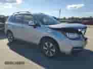 2017 Subaru Forester Limited with VIN JF2SJALC2HH407768, listed as a Copart auction lot 87364875 with 36,703 mi miles and Salvage title. Bid and sale history available at DreamBid. Image 4.