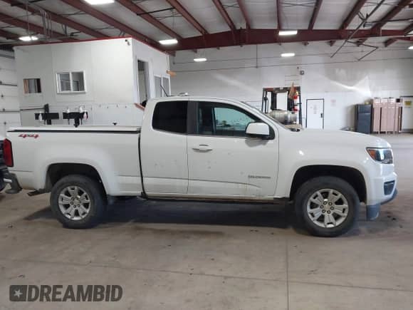 2020 Chevrolet Colorado 4WD LT z VIN 1GCHTCEA2L1175815, wystawiony jako IAAI lot #41956398 z przebiegiem 51 921 mil mil oraz . Historia ofert i sprzedaży dostępna na DreamBid. Obrazek 13.