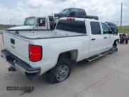 ✅ 2017 Chevrolet Silverado 2500HD Work Truck • VIN: 1GC1KUEG1HF101312 • Lot: 42435610. Listed on IAAI with 120,959 mi. Free auction sales archive from the USA and detailed vehicle history report at DreamBid. Image 4.
