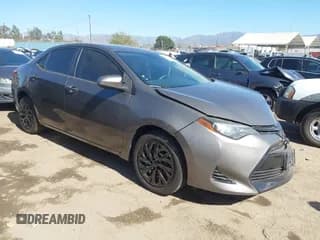 ✅ 2018 Toyota Corolla LE • VIN: 5YFBURHE4JP762661 • Lot: 43534743. Listed on IAAI with 70,095 mi. Free auction sales archive from the USA and detailed vehicle history report at DreamBid. Image 1.