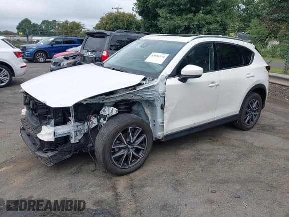 ✅ 2017 Mazda CX-5 Grand Touring • VIN: JM3KFADL9H0190840 • Lot: 43186374. Listed on IAAI with 141,104 mi. Free auction sales archive from the USA and detailed vehicle history report at DreamBid. Image 18.