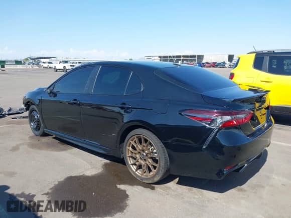 2023 Toyota Camry SE with VIN 4T1G11BK2PU105668, listed as a IAAI auction lot 43013320 with 39,694 mi miles and . Bid and sale history available at DreamBid. Image 3.