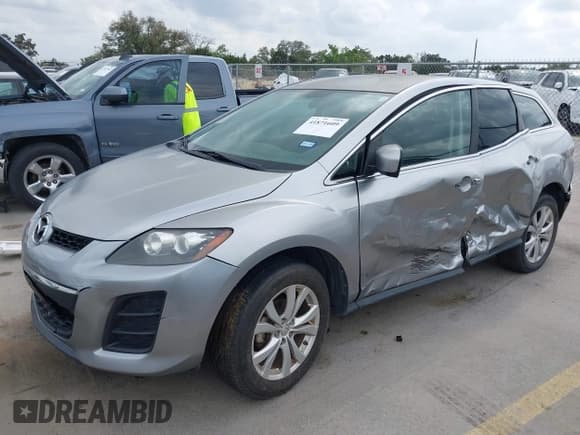 ✅ 2010 Mazda CX-7 Touring • VIN: JM3ER2W38A0342538 • Лот: 41871609. Опубликован ранее на IAAI с пробегом 186 749 миль. Бесплатный доступ к архиву аукционных продаж из США и подробный отчёт об истории автомобиля на DreamBid. Изображение 17.