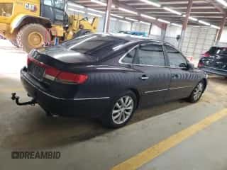 2006 Hyundai Azera SE с VIN KMHFC46F36A096628, выставлен на аукционе Copart как лот 61042145 с пробегом 229 357 миль миль и Списание • Salvage title. История ставок и продаж доступна на DreamBid. Изображение 3.