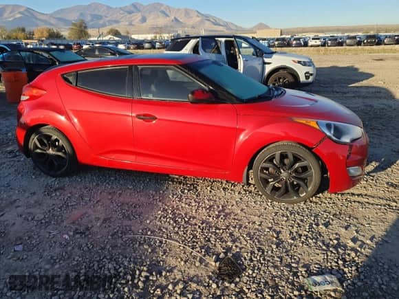 2012 Hyundai Veloster w/Red Int z VIN KMHTC6AD5CU067498, wystawiony jako Copart lot #90810075 z przebiegiem 132 773 mil mil oraz Czysty tytuł • Clean title. Historia ofert i sprzedaży dostępna na DreamBid. Obrazek 4.