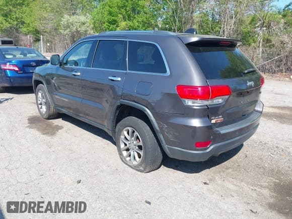 ✅ 2014 Jeep Grand Cherokee Limited • VIN: 1C4RJFBG0EC569499 • Lot: 42187067. Listed on IAAI with 146,159 mi. Free auction sales archive from the USA and detailed vehicle history report at DreamBid. Image 3.