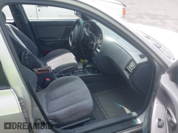 ✅ 2001 Hyundai Elantra GLS • VIN: KMHDN45D81U215217 • Lot: 42739407. Wystawiony na IAAI z przebiegiem 240 631 mil. Bezpłatny archiwum sprzedaży aukcyjnych z USA i szczegółowy raport historii pojazdu na DreamBid. Zdjęcie 5.