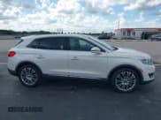 ✅ 2018 Lincoln MKX Reserve • VIN: 2LMPJ6LR0JBL26437 • Lot: 43506847. Listed on IAAI with 24,939 mi. Free auction sales archive from the USA and detailed vehicle history report at DreamBid. Image 13.