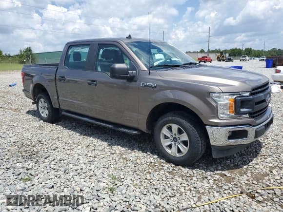 ✅ 2020 Ford F-150 XL • VIN: 1FTEW1C43LFC23983 • Lot: 64372215. Listed on Copart with 99,274 mi. Free auction sales archive from the USA and detailed vehicle history report at DreamBid. Image 4.