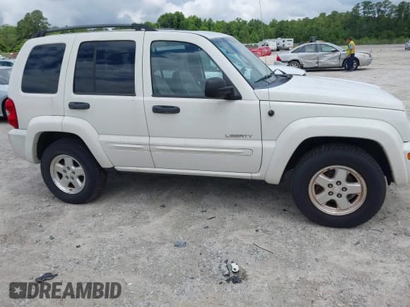 ✅ 2004 Jeep Liberty Limited • VIN: 1J4GL58KX4W273534 • Lot: 42457094. Listed on IAAI with 135,784 mi. Free auction sales archive from the USA and detailed vehicle history report at DreamBid. Image 1.