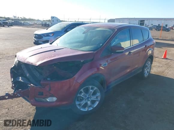 ✅ 2013 Ford Escape SEL • VIN: 1FMCU9H94DUC96014 • Lot: 43150647. Listed on IAAI with 294,450 mi. Free auction sales archive from the USA and detailed vehicle history report at DreamBid. Image 2.