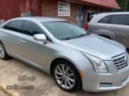 ✅ 2013 Cadillac XTS Luxury • VIN: 2G61P5S33D9171411 • Лот: 59880945. Опубликован ранее на Copart с пробегом 268 029 миль. Бесплатный доступ к архиву аукционных продаж из США и подробный отчёт об истории автомобиля на DreamBid. Изображение 1.