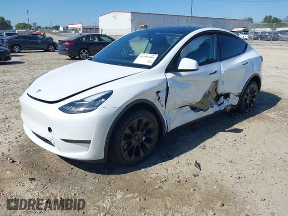 ✅ 2023 Tesla Model Y Long Range • VIN: 7SAYGDEE7PA123770 • Лот: 43191209. Опубликован ранее на IAAI с пробегом 33 084 миль. Бесплатный доступ к архиву аукционных продаж из США и подробный отчёт об истории автомобиля на DreamBid. Изображение 2.