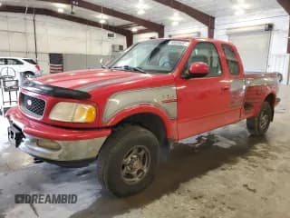 ✅ 1997 Ford F-150 • VIN: 1FTDX08W6VKA53318 • Lot: 90695645. Wystawiony na Copart z przebiegiem 267 040 mil. Bezpłatny archiwum sprzedaży aukcyjnych z USA i szczegółowy raport historii pojazdu na DreamBid. Zdjęcie 1.