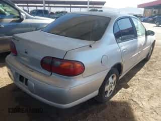 2003 Chevrolet Malibu LS z VIN 1G1NE52J63M515861, wystawiony jako IAAI lot #41552694 z przebiegiem 180 086 mil mil oraz . Historia ofert i sprzedaży dostępna na DreamBid. Obrazek 4.