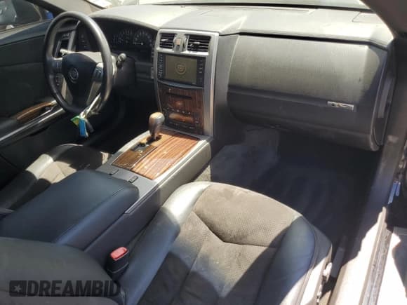 ✅ 2006 Cadillac XLR-V • VIN: 1G6YX36D565603678 • Lot: 68793655. Wystawiony na Copart z przebiegiem 35 616 mil. Bezpłatny archiwum sprzedaży aukcyjnych z USA i szczegółowy raport historii pojazdu na DreamBid. Zdjęcie 8.