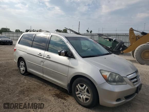 ✅ 2007 Honda Odyssey EX • VIN: 5FNRL38467B111669 • Lot: 80848905. Listed on Copart with Not provided. Free auction sales archive from the USA and detailed vehicle history report at DreamBid. Image 4.