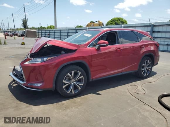 ✅ 2022 Lexus RX 350L • VIN: JTJHZKEA5N2026284 • Лот: 58706035. Опубликован ранее на Copart с пробегом 26 597 миль. Бесплатный доступ к архиву аукционных продаж из США и подробный отчёт об истории автомобиля на DreamBid. Изображение 1.