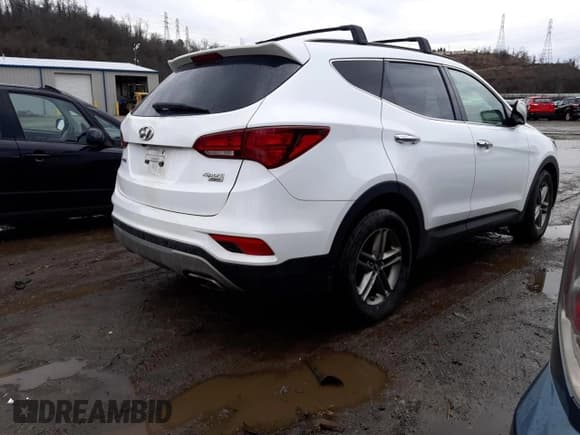 ✅ 2017 Hyundai Santa Fe 2.4L • VIN: 5NMZUDLB3HH037412 • Лот: 42044163. Опубликован ранее на Copart с пробегом 86 318 миль. Бесплатный доступ к архиву аукционных продаж из США и подробный отчёт об истории автомобиля на DreamBid. Изображение 3.