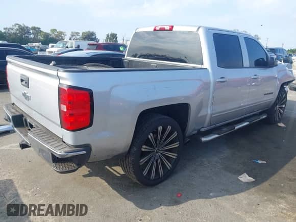 2018 Chevrolet Silverado 1500 LT with VIN 3GCPCREC8JG580088, listed as a IAAI auction lot 43278290 with 72,832 mi miles and . Bid and sale history available at DreamBid. Image 4.