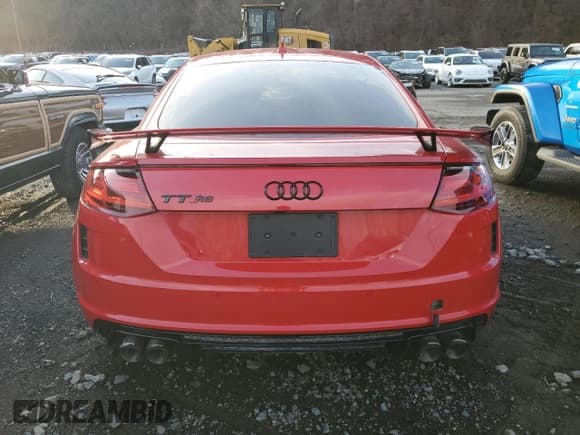 ✅ 2022 Audi TT RS • VIN: WUAASAFV8N1900592 • Lot: 86099274. Wystawiony na Copart z przebiegiem 20 761 mil. Bezpłatny archiwum sprzedaży aukcyjnych z USA i szczegółowy raport historii pojazdu na DreamBid. Zdjęcie 6.