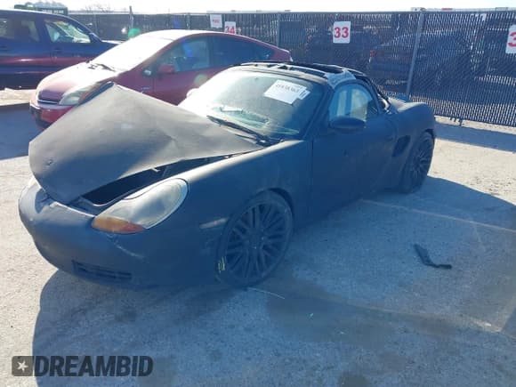 ✅ 1998 Porsche Boxster • VIN: WP0CA2982WU621935 • Лот: 41838363. Опубликован ранее на IAAI с пробегом Не указан. Бесплатный доступ к архиву аукционных продаж из США и подробный отчёт об истории автомобиля на DreamBid. Изображение 2.