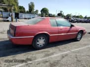 ✅ 2000 Cadillac Eldorado • VIN: 1G6EL12Y2YU151886 • Lot: 65156625. Wystawiony na Copart z przebiegiem 81 430 mil. Bezpłatny archiwum sprzedaży aukcyjnych z USA i szczegółowy raport historii pojazdu na DreamBid. Zdjęcie 3.
