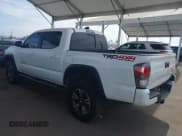 ✅ 2021 Toyota Tacoma SR • VIN: 3TMCZ5AN0MM387565 • Lot: 42300520. Listed on IAAI with 42,153 mi. Free auction sales archive from the USA and detailed vehicle history report at DreamBid. Image 3.