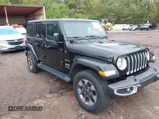✅ 2022 Jeep Wrangler Unlimited Sahara • VIN: 1C4HJXEGXNW267813 • Lot: 40331024. Listed on IAAI with 30,905 mi. Free auction sales archive from the USA and detailed vehicle history report at DreamBid. Image 1.